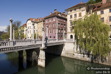 Slovenia, Greater Ljubljana, Ljubljana, Ljubljanica River lined with historical painted houses.