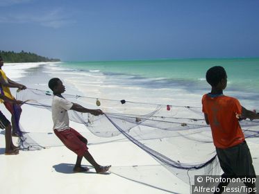 Africa, Tanzania, Zanzibar, Fishermen on the Beach.