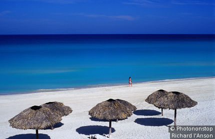 Thatched umbrellas on beach