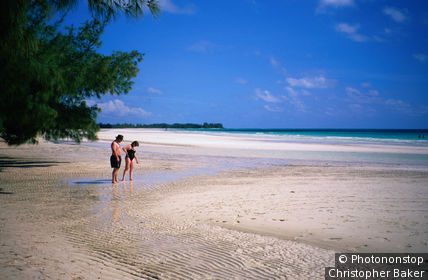 A couple play in the shallows of Grand Bahama in Freeport.