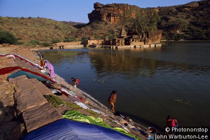 India;Karnataka;Badami - Ancient capital of the Chalukyas, who ruled the Deccan from the 4th to 8th centuries, Badami's Agastya Lake reverberates to the thwack of beaten laundry and the chatter of local women