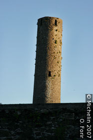Round clock tower and cross